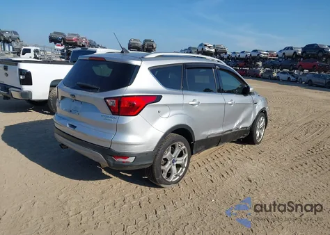 2019 Ford Escape Titanium z USA, uszkodzony, nr VIN 1FMCU0J90KUA50497